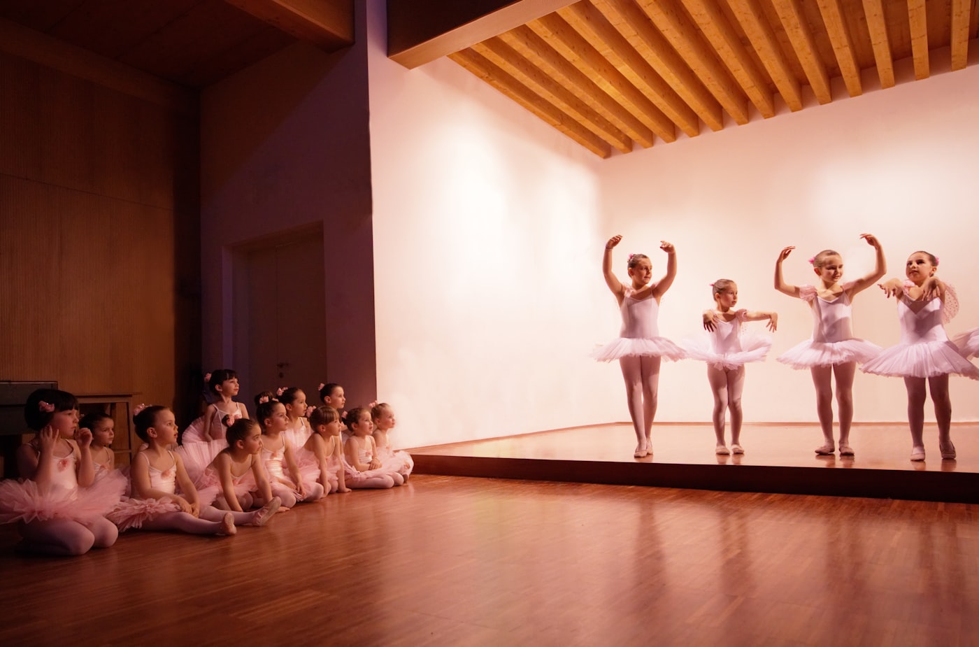 Young children in a ballet class in tutus