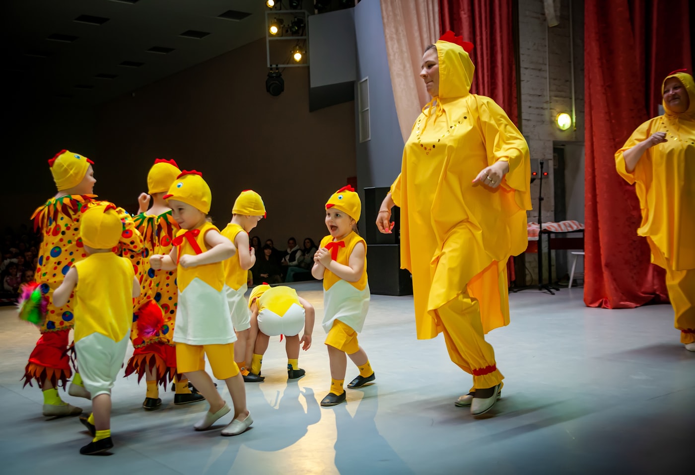 Children performing on stage at a drama club